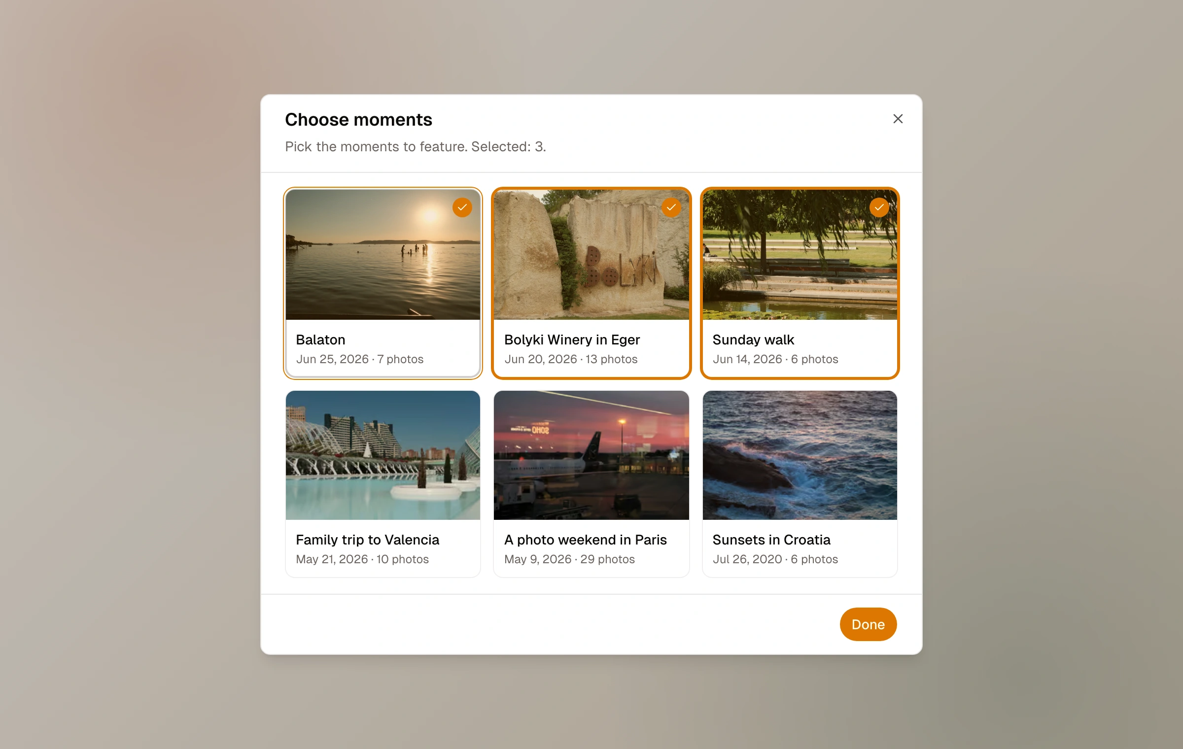 The Choose moments dialog with six real moment cards and three selected for a collection